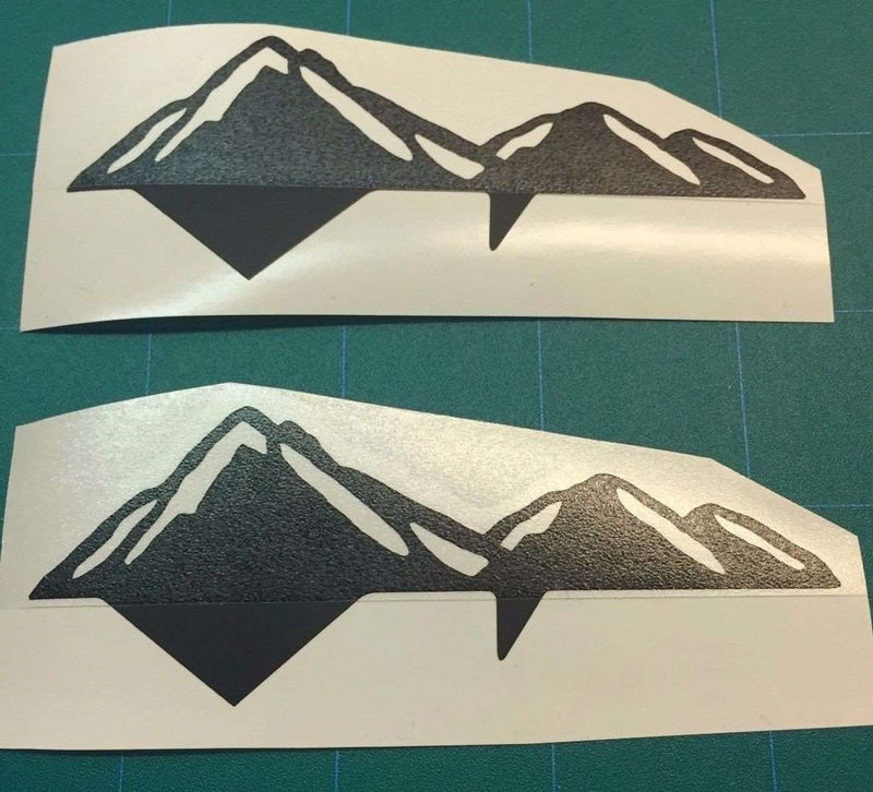 Load image into Gallery viewer, Premium Cast Matte Black Vinyl Decal Mountains for 2016-2026 Tacoma Doors

