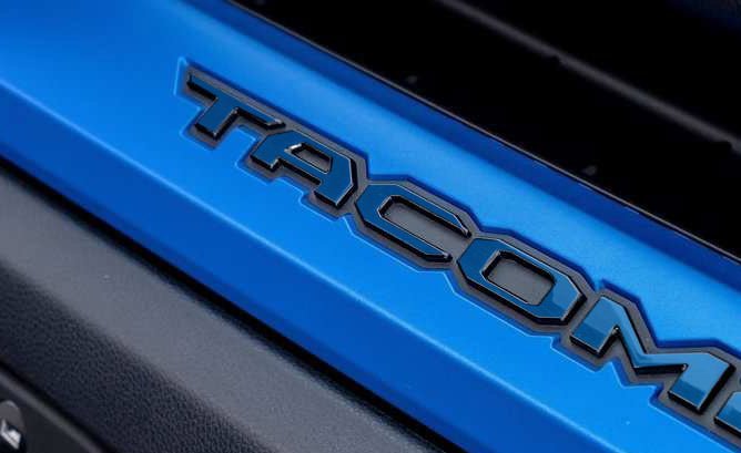 Load image into Gallery viewer, Premium Cast Vinyl Decal Letter Inlays for 2024-2026 Tacoma Dashboard Emblem
