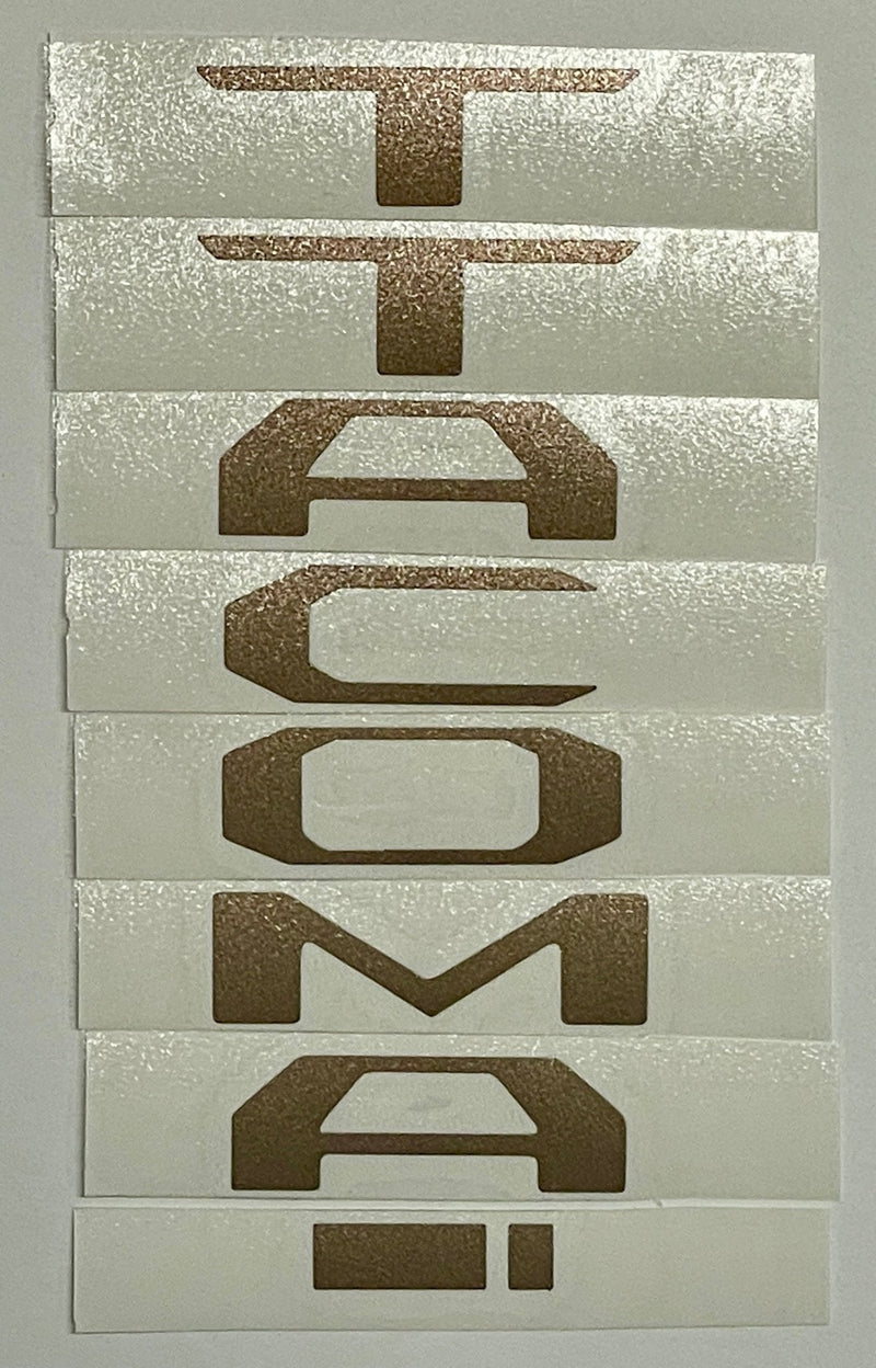 Load image into Gallery viewer, Premium Cast Vinyl Decal Letter Inlays for 2024-2026 Tacoma Dashboard Emblem
