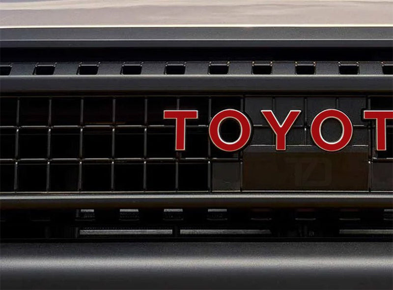 Load image into Gallery viewer, Premium Cast Vinyl Decal Inlay Letters for 2024-2026 Land Cruiser Grille
