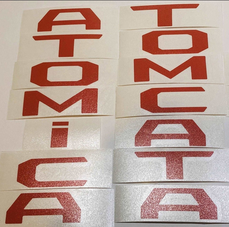Load image into Gallery viewer, Premium Cast Vinyl Decal Letters for 2024-2026 Tacoma Door Emblems
