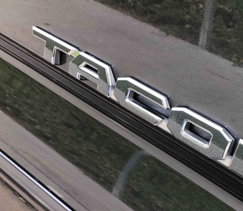 Load image into Gallery viewer, Premium Cast Vinyl Decal Letters for 2016-2023 Tacoma Door and Tailgate Emblems
