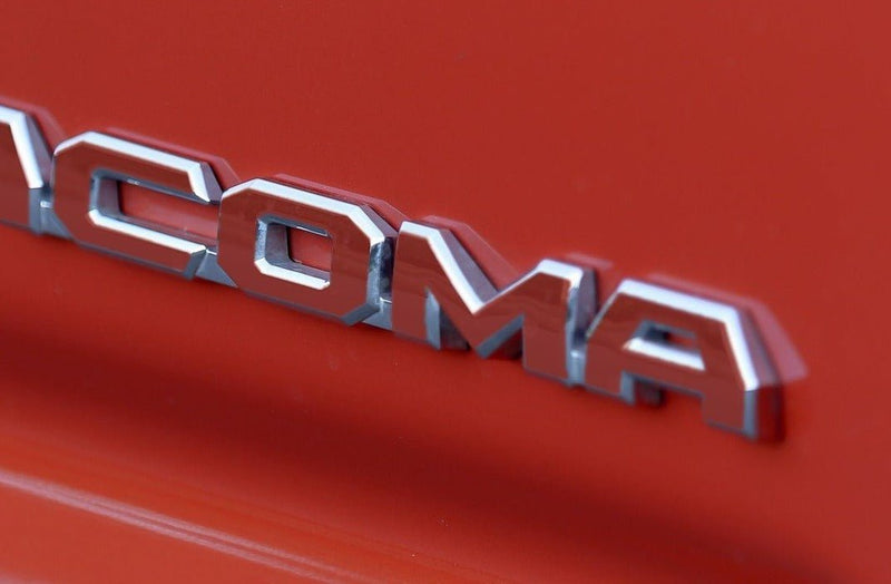 Load image into Gallery viewer, Premium Cast Vinyl Decal Letters for 2016-2023 Tacoma Door and Tailgate Emblems
