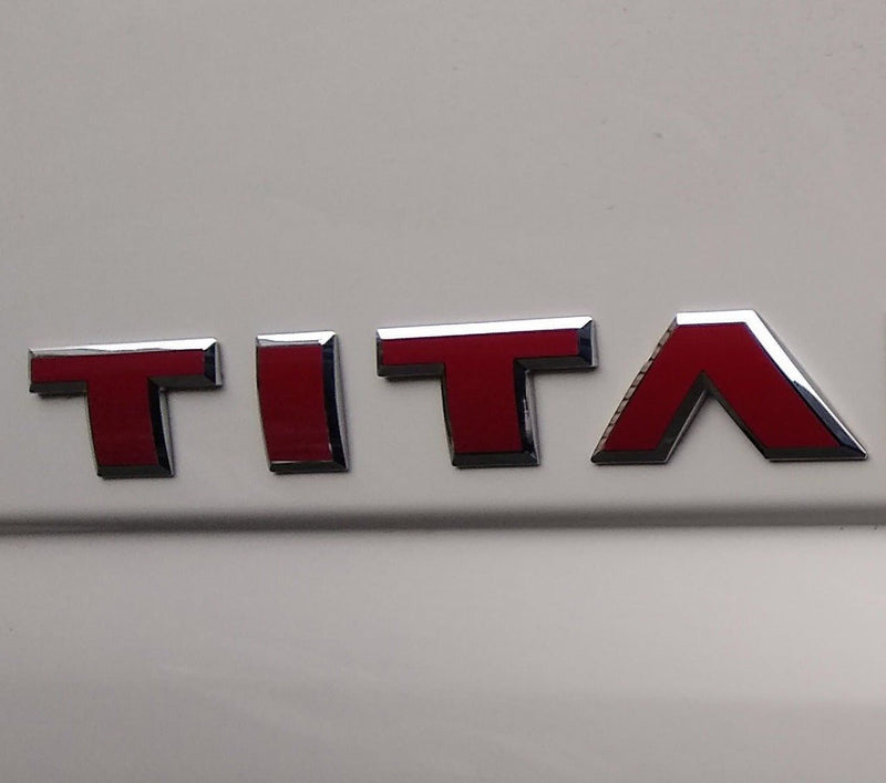Load image into Gallery viewer, Premium Cast Vinyl Decal Letter Inlays for 2016-2024 Titan Doors and Tailgate
