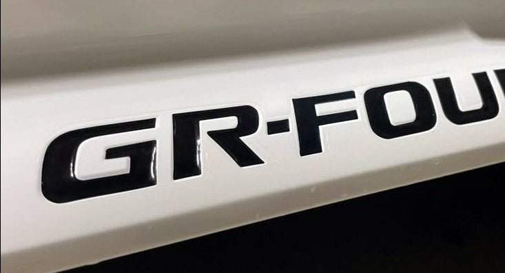 Load image into Gallery viewer, Premium Cast Vinyl Decal Letter Inserts for 2023-2025 Corolla GR-Four Rocker Panels
