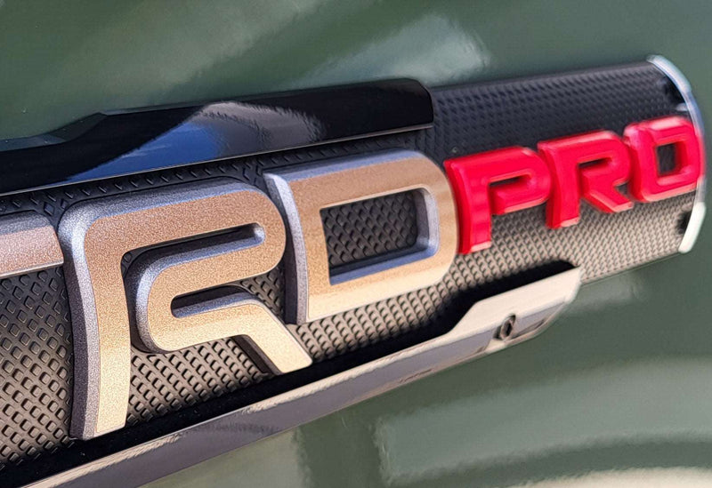 Load image into Gallery viewer, Premium Cast Vinyl Decal Letter Inlays for 2017-2021 Tacoma TRD Pro Door Emblems

