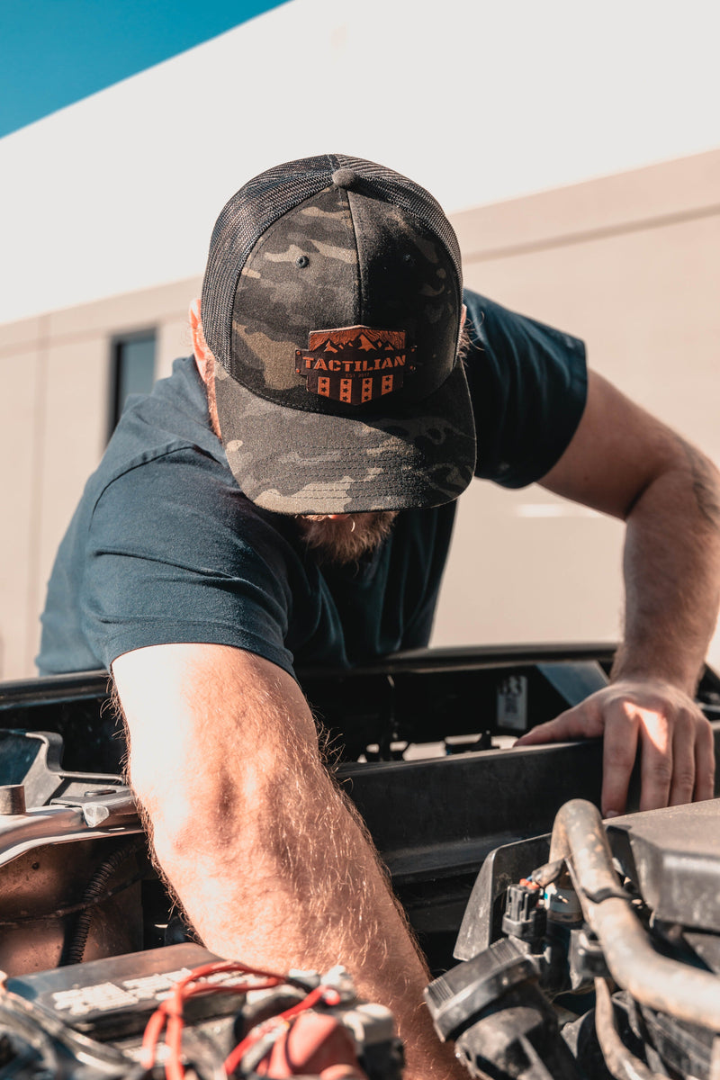 Load image into Gallery viewer, Tactilian Black Multicam Leather Patch Snap Back Hat
