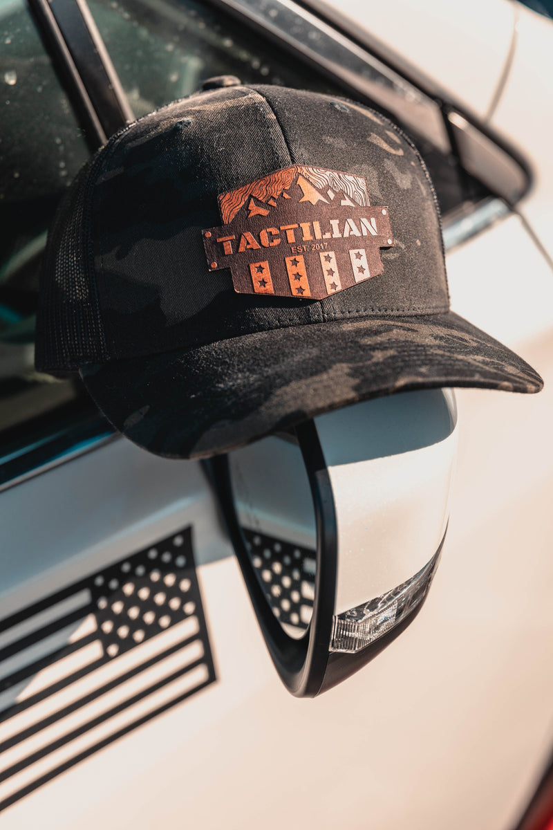 Load image into Gallery viewer, Tactilian Black Multicam Leather Patch Snap Back Hat
