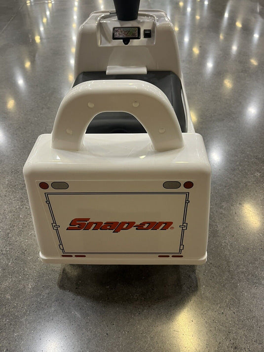 Rev Up Your Child's Playtime with the Snap On Tools White Truck Ride-On Toy - Complete with Sound Effects!