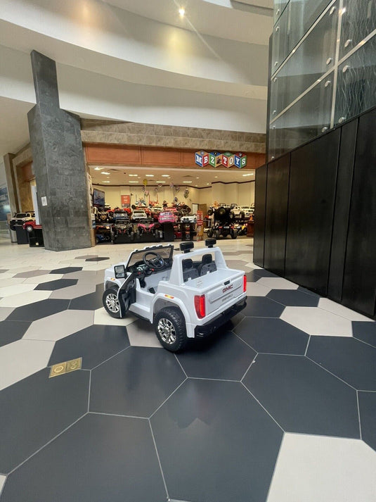 24V Interactive TV GMC Ride On Electric Toy 4x4 with Leather Seating and Advanced Rubber EVA Tires - Remote Control