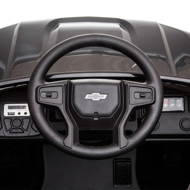 Load image into Gallery viewer, Black Chevy Silverado 4x4 Trail Boss Monster Truck Ride-On with Big Wheels
