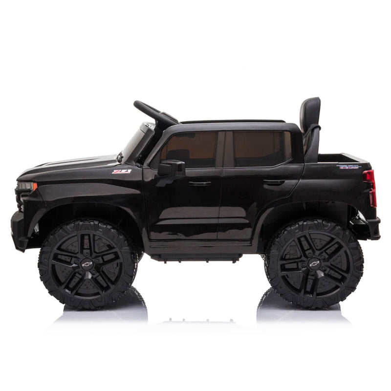 Load image into Gallery viewer, Black Chevy Silverado 4x4 Trail Boss Monster Truck Ride-On with Big Wheels
