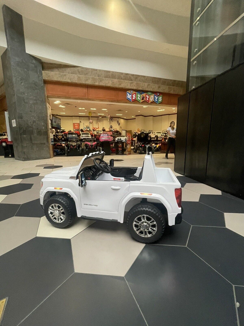 Load image into Gallery viewer, 24V Interactive TV GMC Ride On Electric Toy 4x4 with Leather Seating and Advanced Rubber EVA Tires - Remote Control
