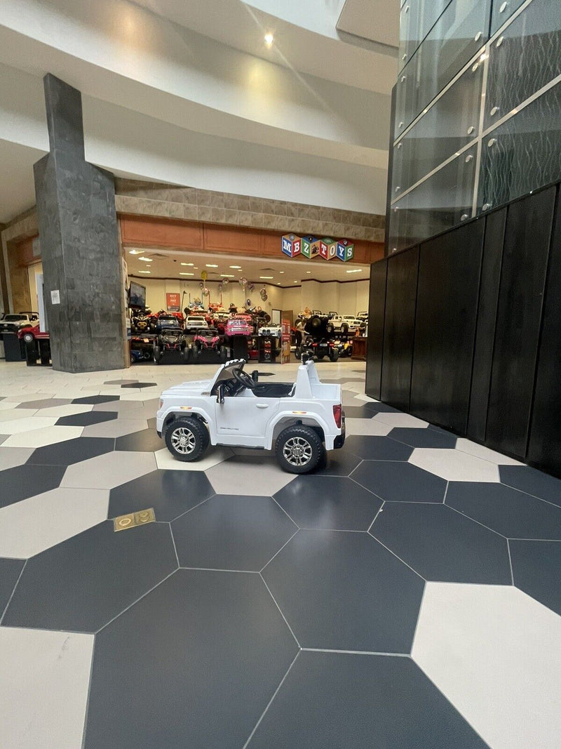 Load image into Gallery viewer, 24V Interactive TV GMC Ride On Electric Toy 4x4 with Leather Seating and Advanced Rubber EVA Tires - Remote Control
