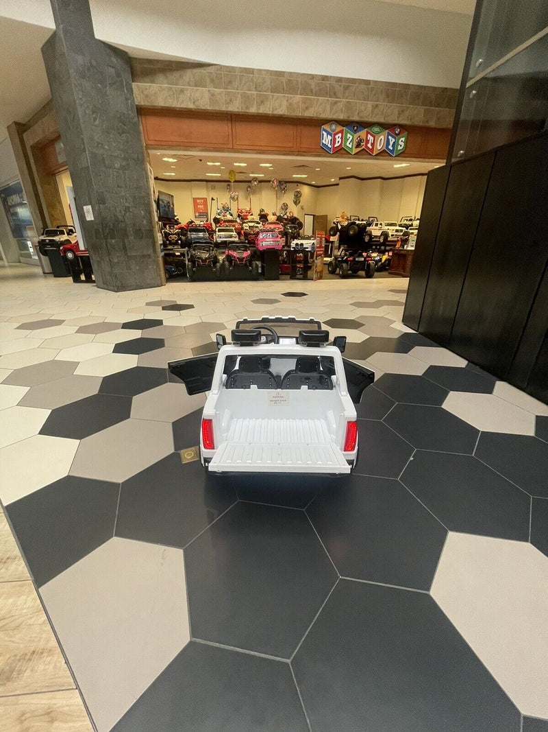 Load image into Gallery viewer, 24V Interactive TV GMC Ride On Electric Toy 4x4 with Leather Seating and Advanced Rubber EVA Tires - Remote Control
