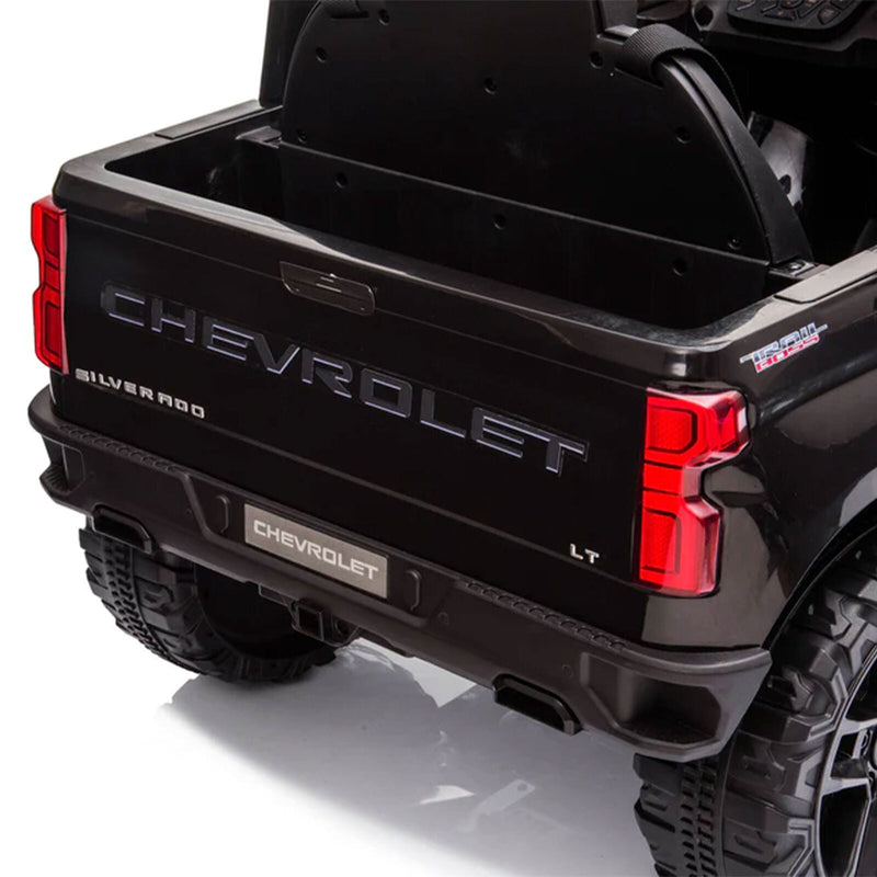 Load image into Gallery viewer, Black Chevy Silverado 4x4 Trail Boss Monster Truck Ride-On with Big Wheels
