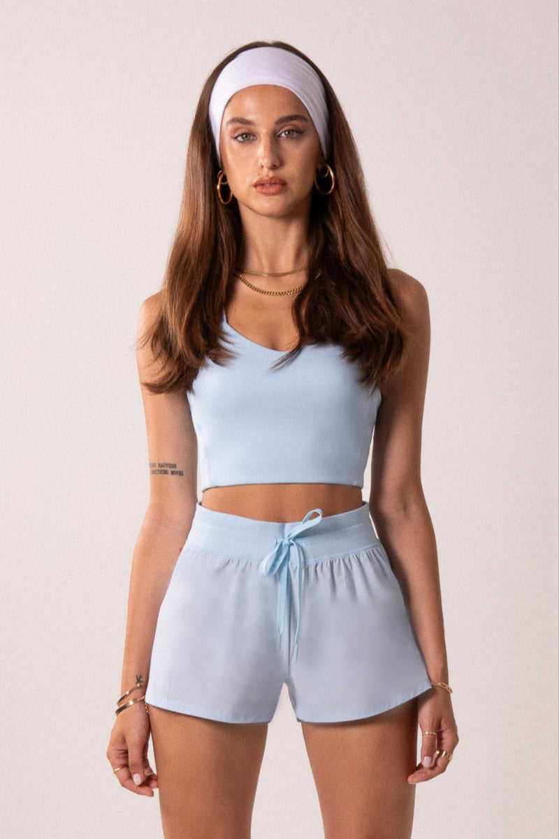 Load image into Gallery viewer, Women's Workout Tank Top with Phone Pockets - Baby Blue | LuxeForm Criss-Cross Back
