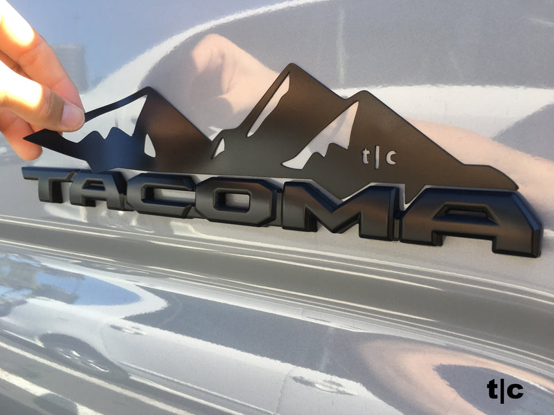 Load image into Gallery viewer, Toyota Tacoma Badge Mountain Range Magnet (2016+)
