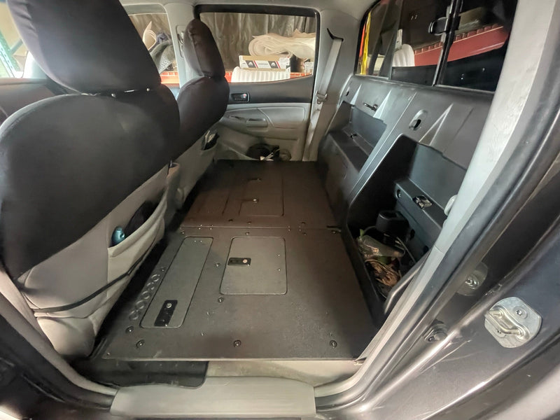 Load image into Gallery viewer, Toyota Tacoma 2005-2023 2nd and 3rd Gen. Double Cab - Second Row Seat Delete Plate System keeping Factory Back Wall
