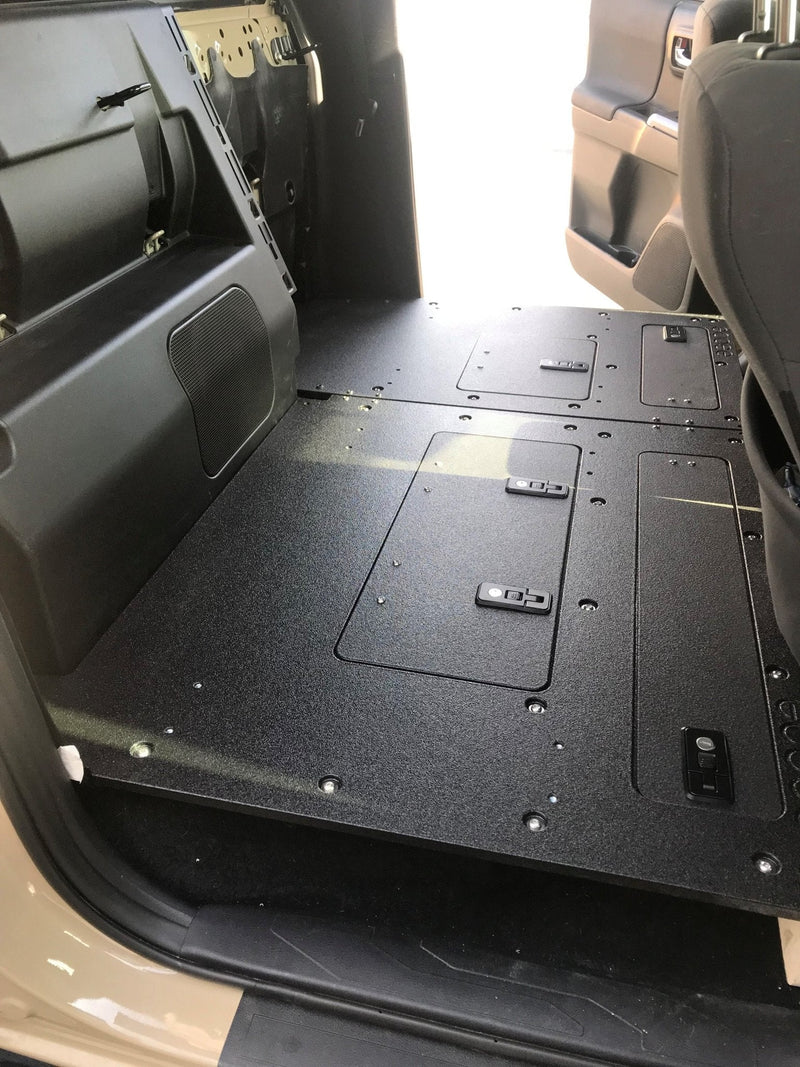 Load image into Gallery viewer, Toyota Tacoma 2005-2023 2nd and 3rd Gen. Double Cab - Second Row Seat Delete Plate System keeping Factory Back Wall
