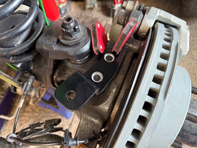 Load image into Gallery viewer, Dana/Spicer "Ultimate Dana 60" Steerable Knuckle Pod Light Mounts
